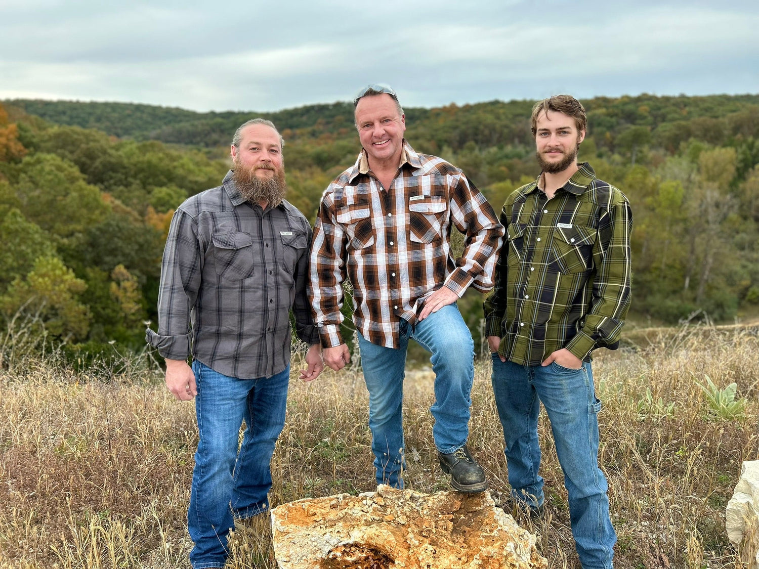 Three men in plaid flannels